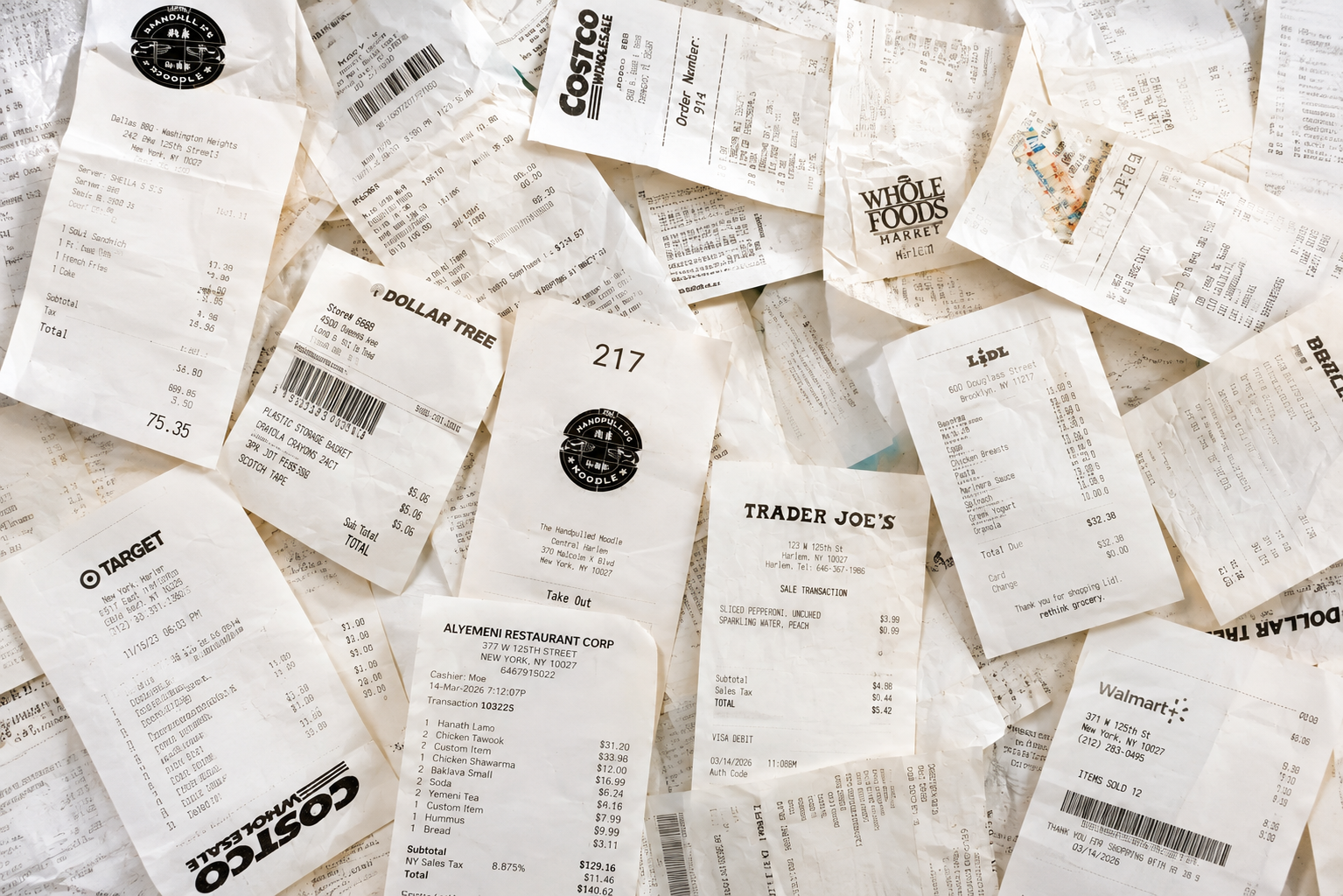 Pile of unsorted paper receipts